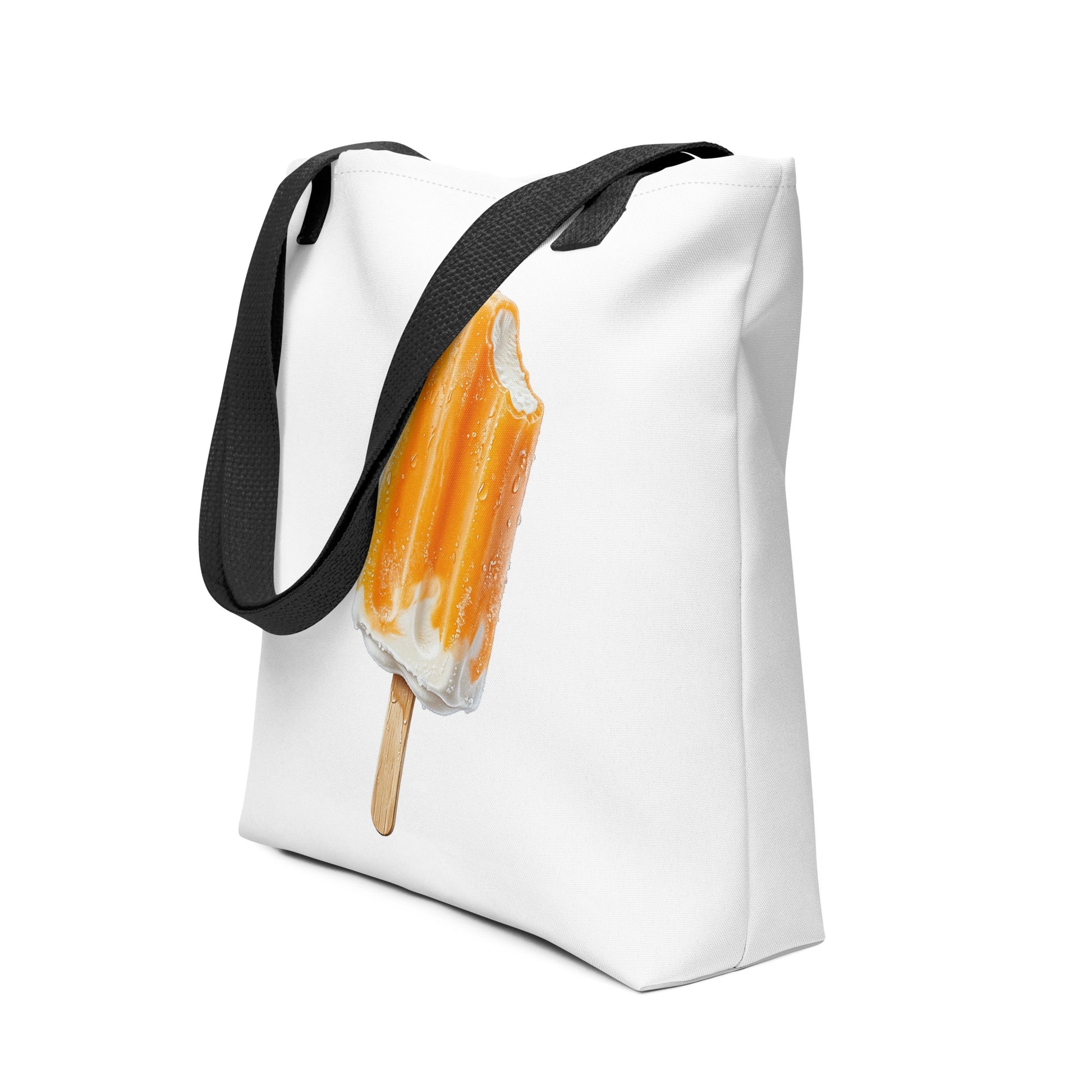 Tote bag with a popsicle design and black strap side view mockup