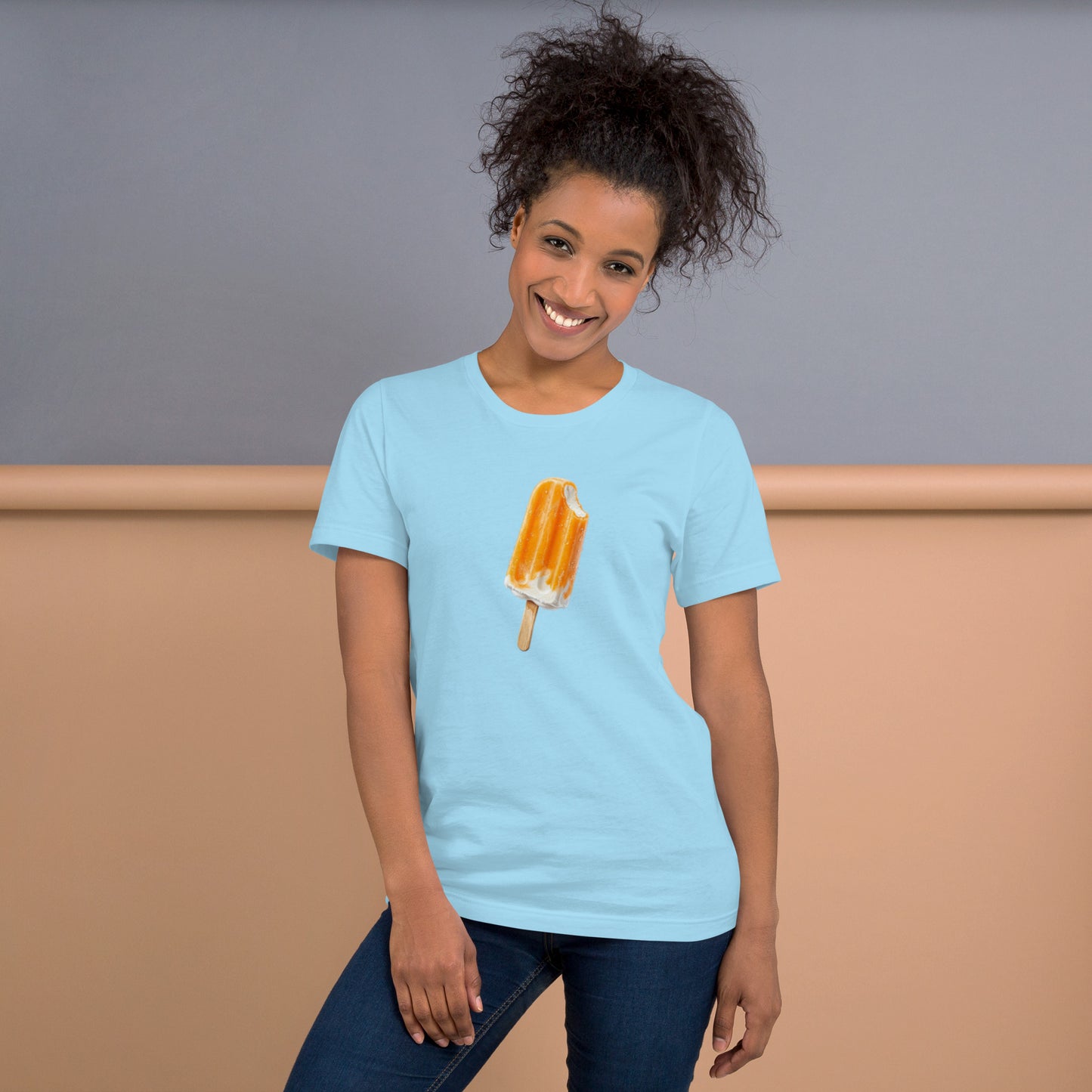 Woman's ocean blue light blue colored t-shirt with a popsicle design