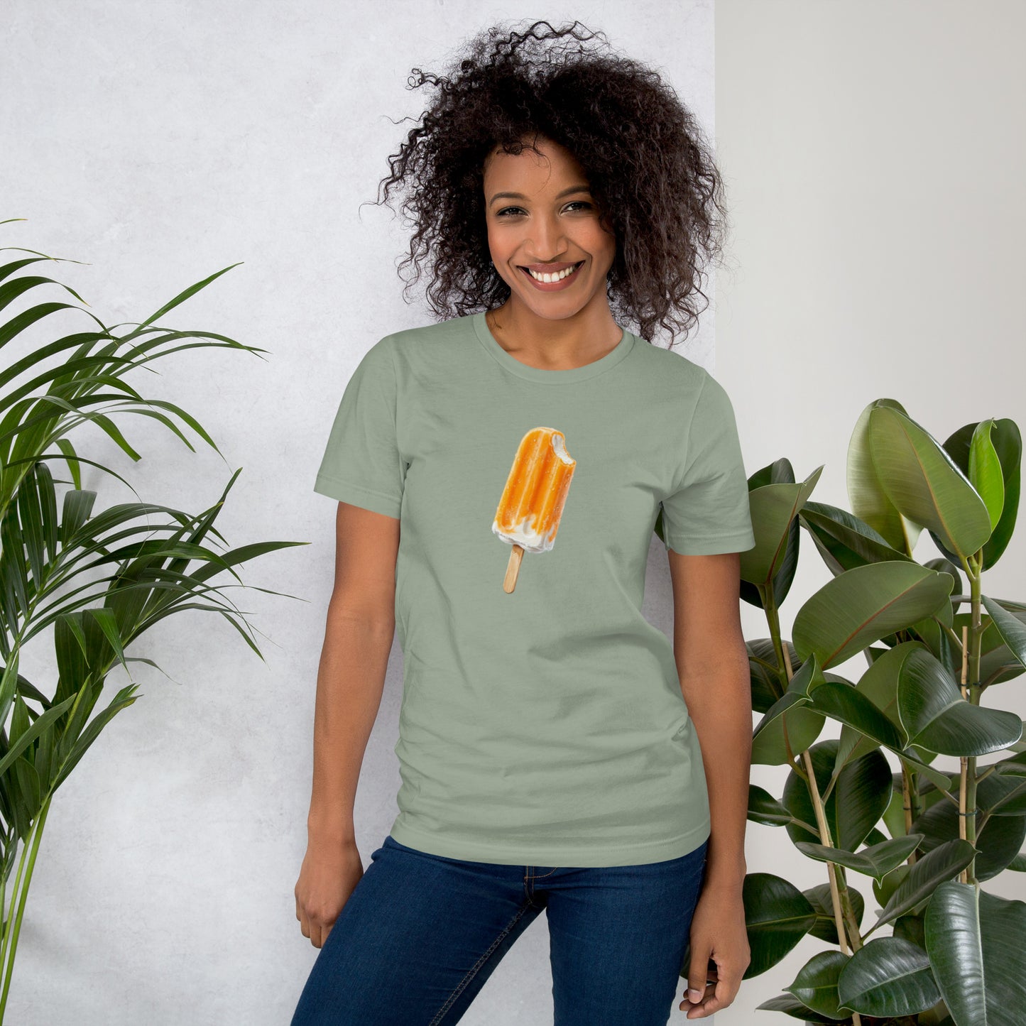 Woman's sage green t-shirt with an orange cream popsicle design