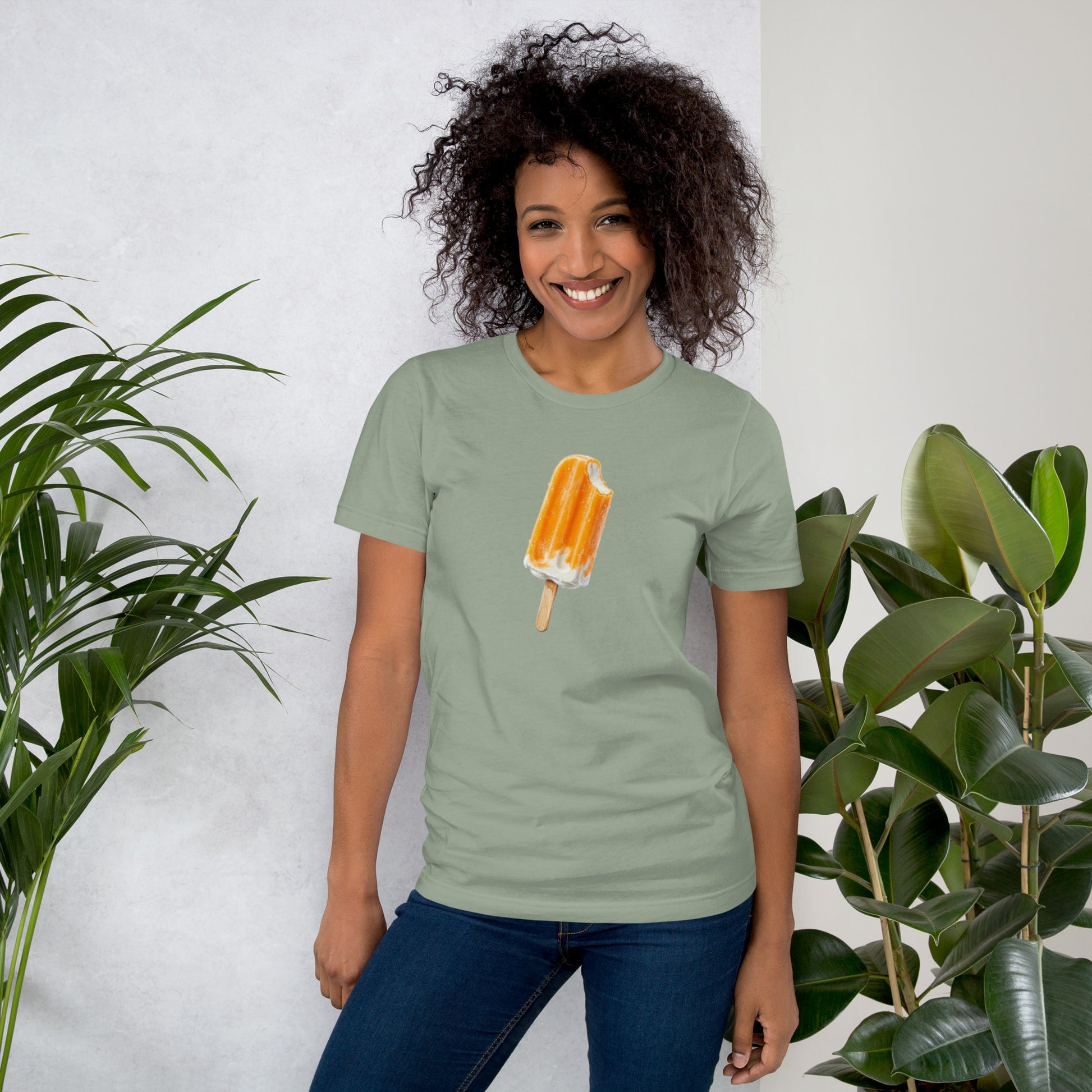 Woman's sage green t-shirt with an orange cream popsicle design