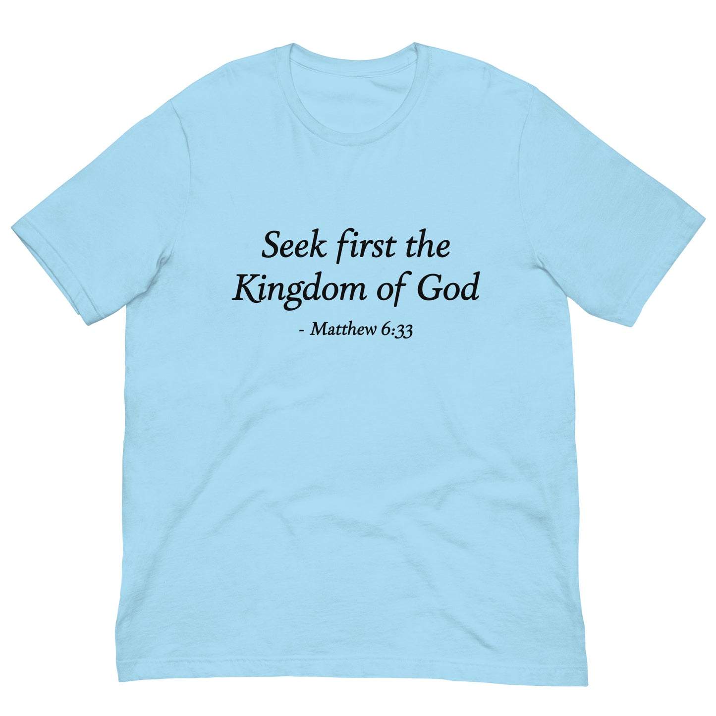 Light blue t-shirt with black text 'Seek first the Kingdom of God - Matthew 6:33'