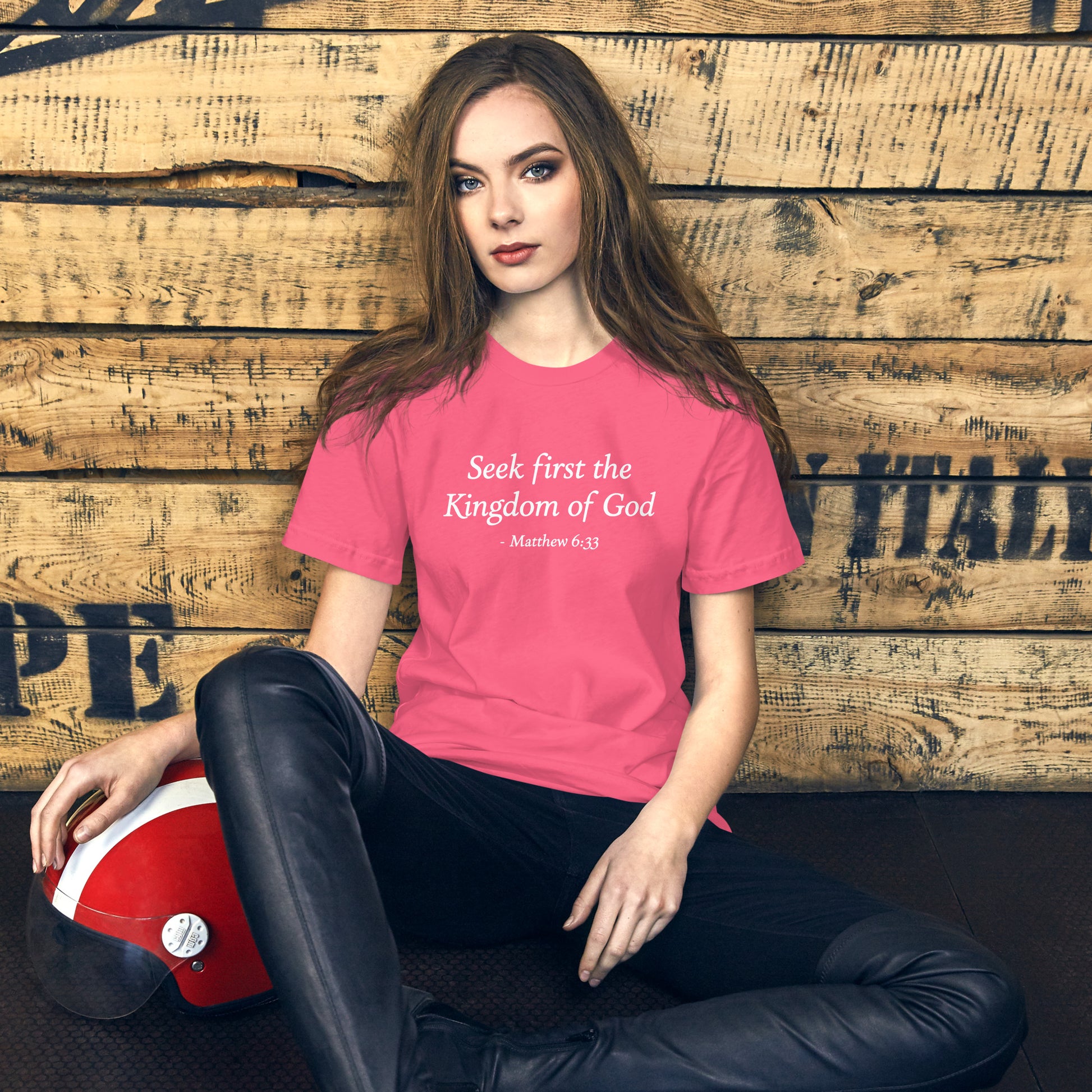 Woman's pink t-shirt with a motivational quote