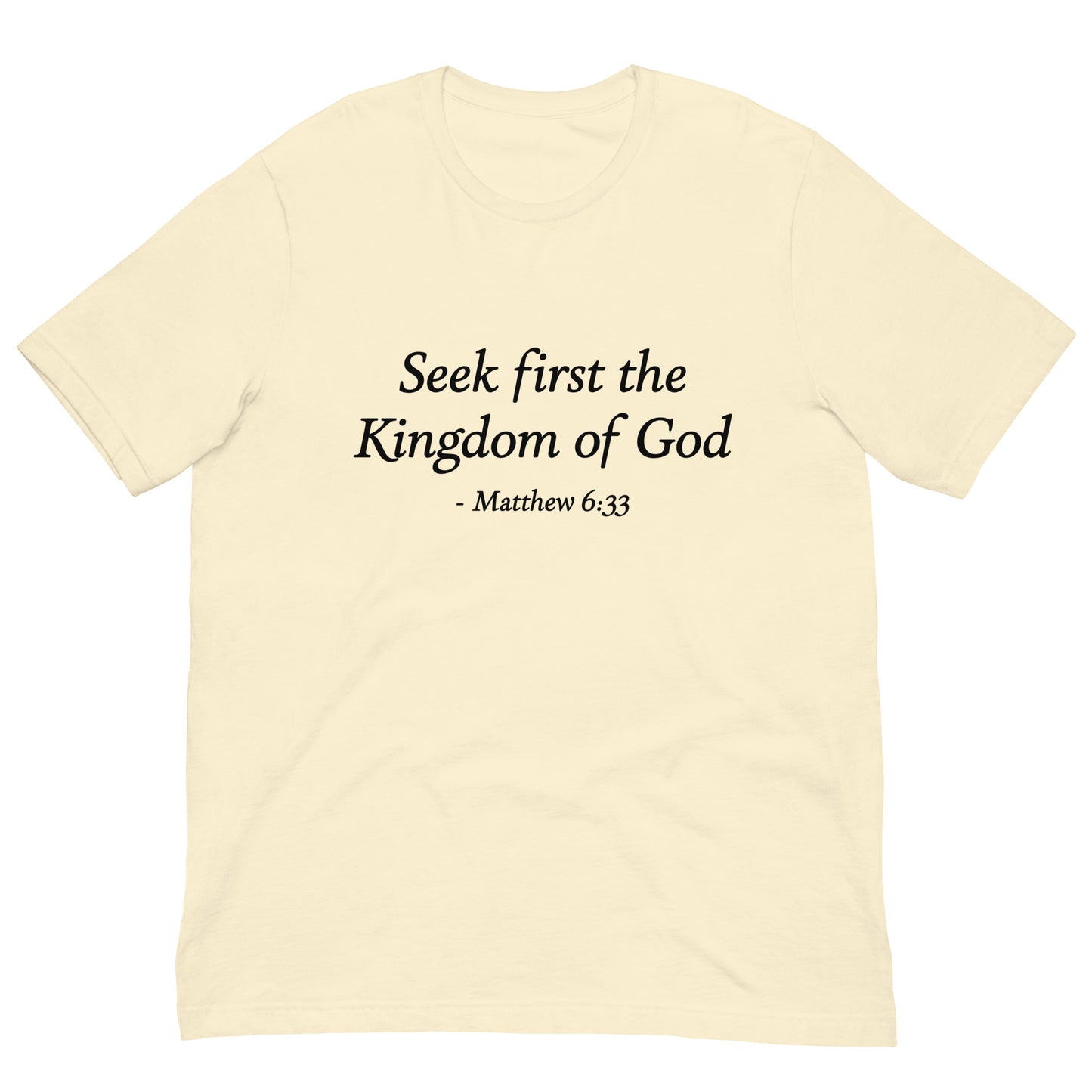 Natural color t-shirt with black text 'Seek first the Kingdom of God - Matthew 6:33' bible verse